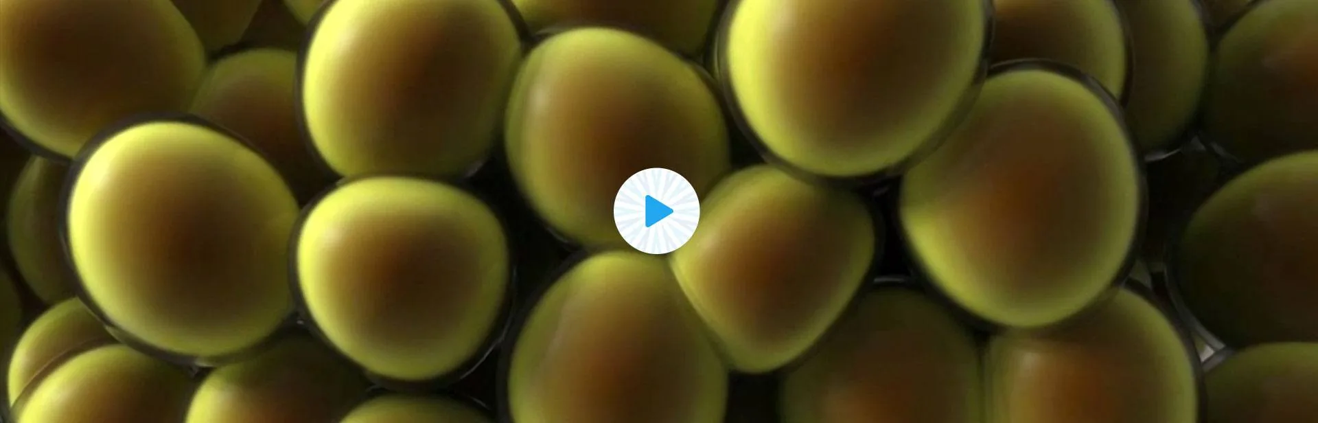 Close-up illustration of fat cells with a play button for CoolSculpting fat freezing in Dublin